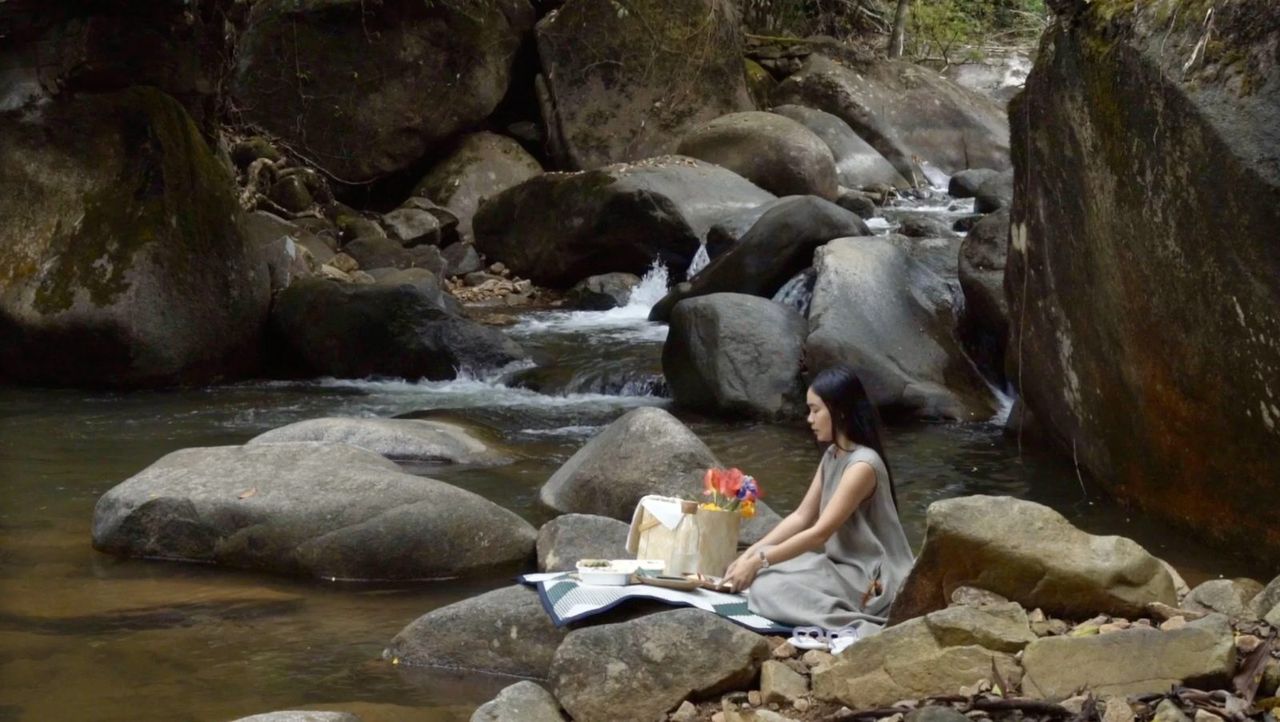 Riverside scene in Thailand — filming a hotel in its landscape